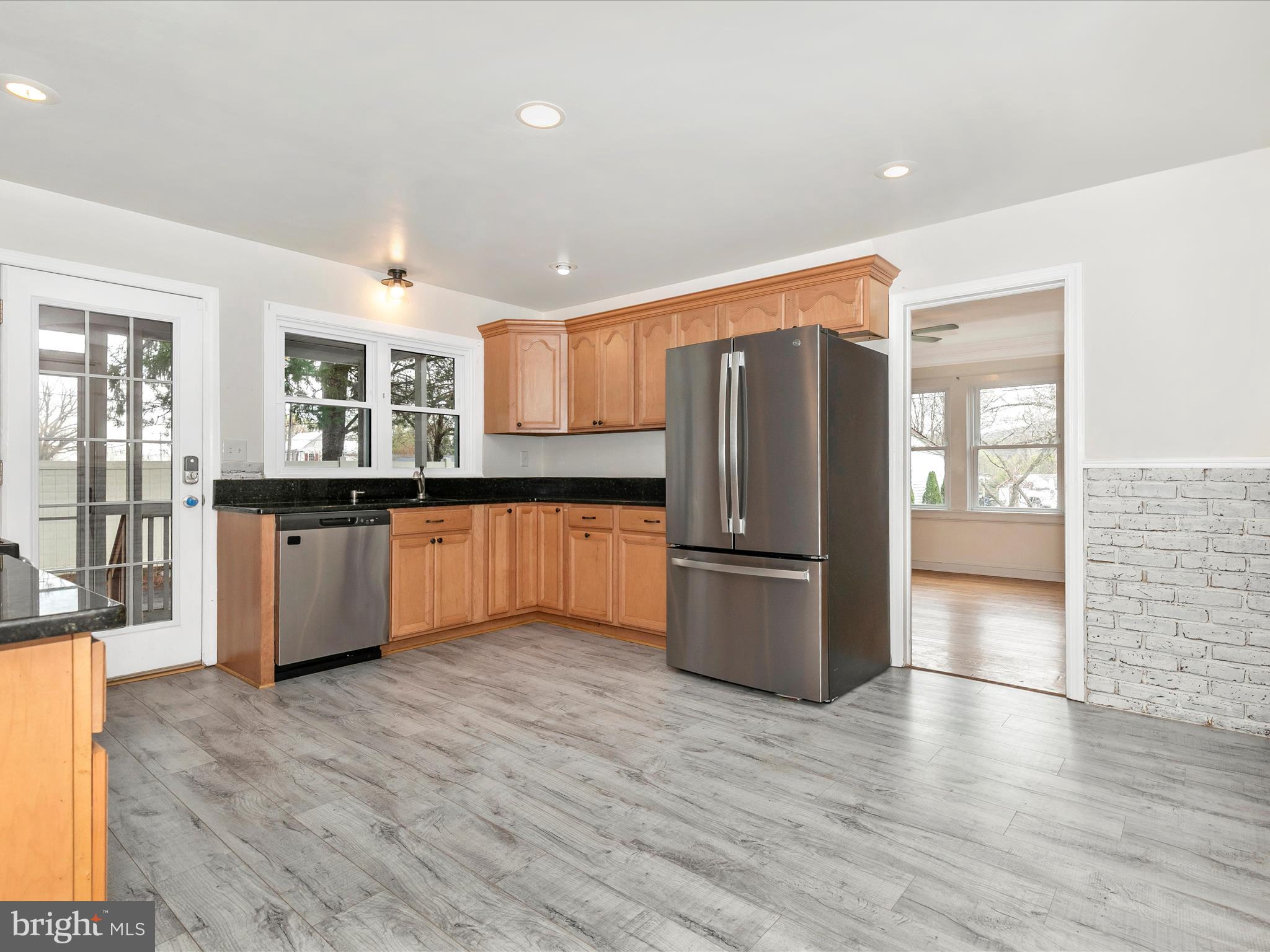 8913 Yellow Springs Road Frederick, MD 21702 - Photo 10 of 77 a kitchen with stainless steel appliances granite countertop a refrigerator and a sink