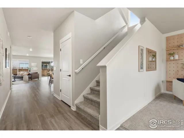 a view of a living room and entryway
