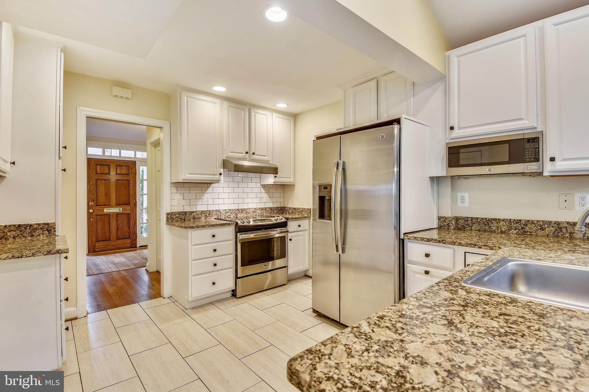 5609 Harwick Road Bethesda, MD 20816 - Photo 8 of 48 Kitchen with granite counters and new flooring