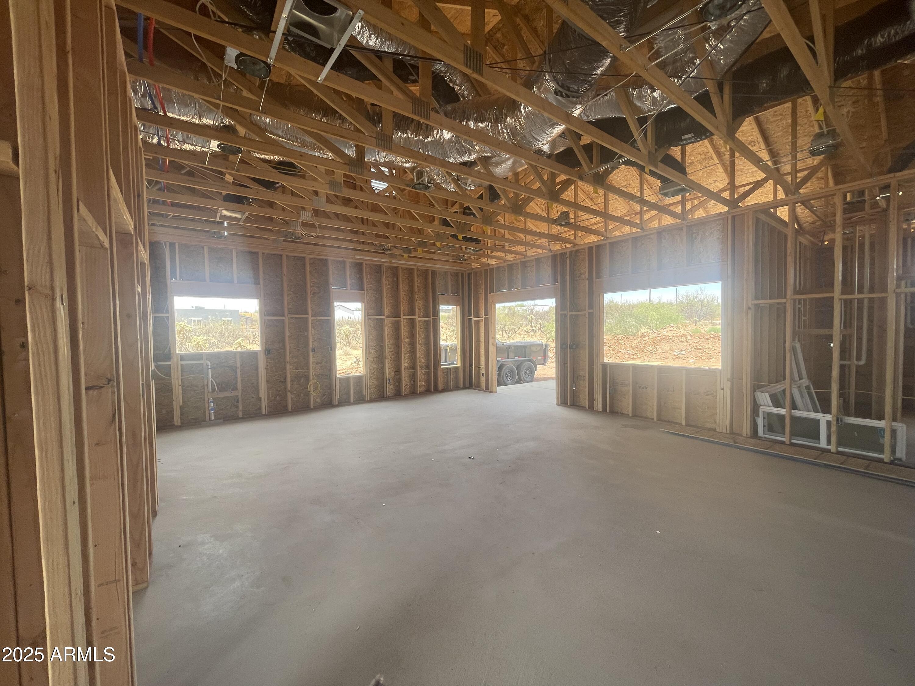 1825 Via Nueva Zelandia Rio Rico, AZ 85648 - Photo 4 of 20 a view of an empty room with a window
