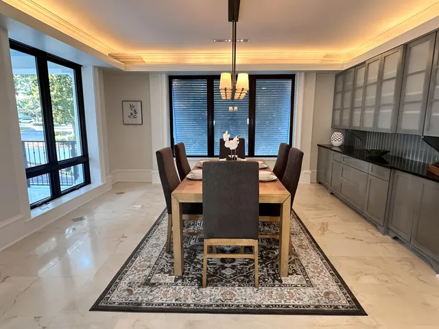 a kitchen with stainless steel appliances granite countertop a stove and a refrigerator