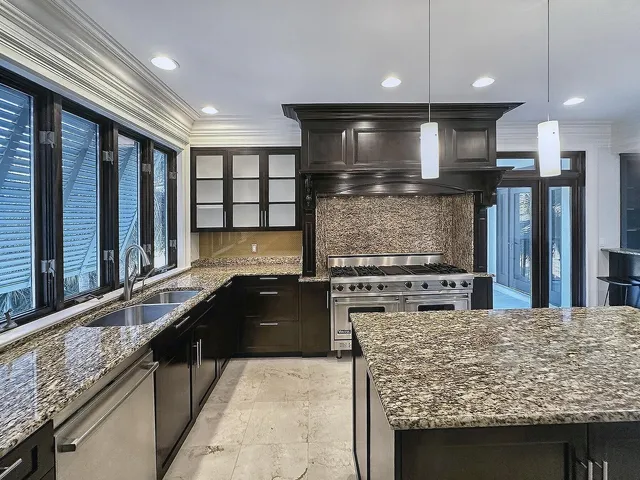 a view of an empty room with glass door