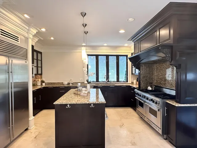 a living room with fireplace furniture and a flat screen tv