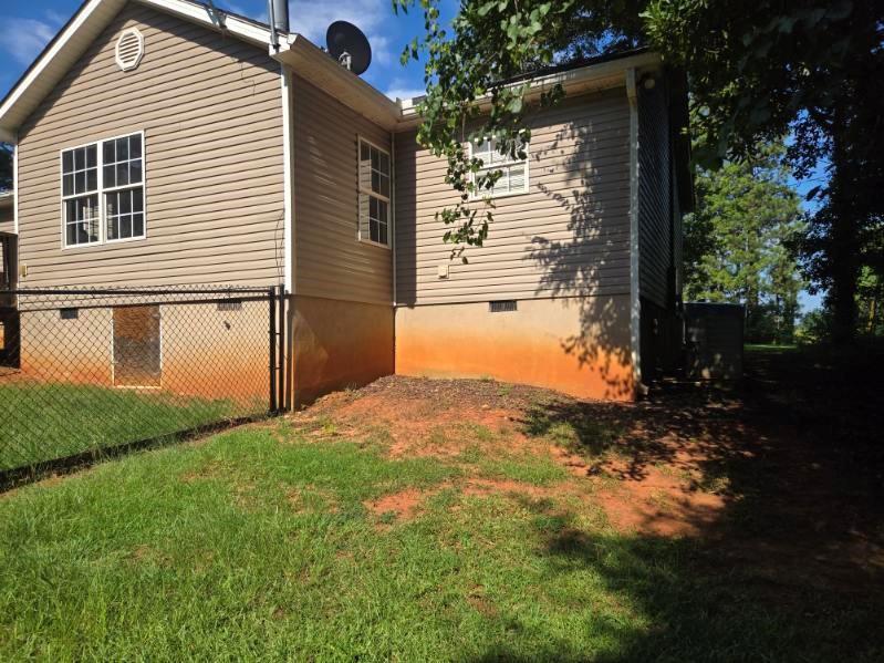 805 Gose Road Forsyth, GA 31029 - Photo 27 of 29 a backyard of a house with lots of green space