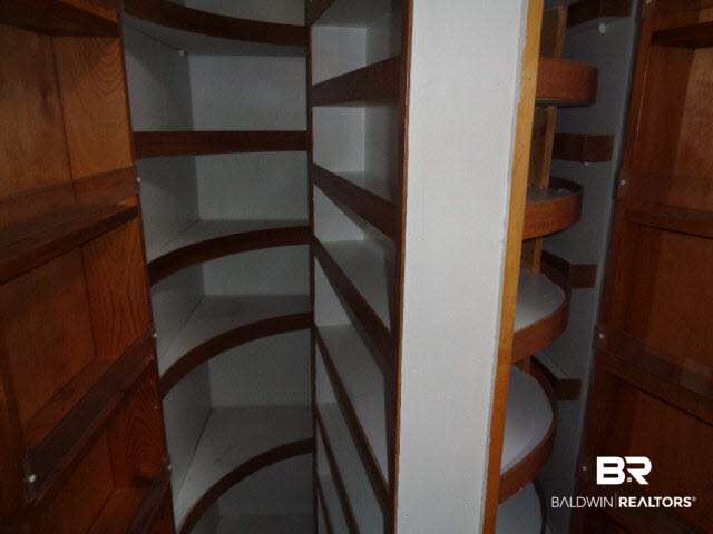 28202 Vargo Lane Elberta, AL 36530 - Photo 12 of 45 Pantry closet with swing shelving.