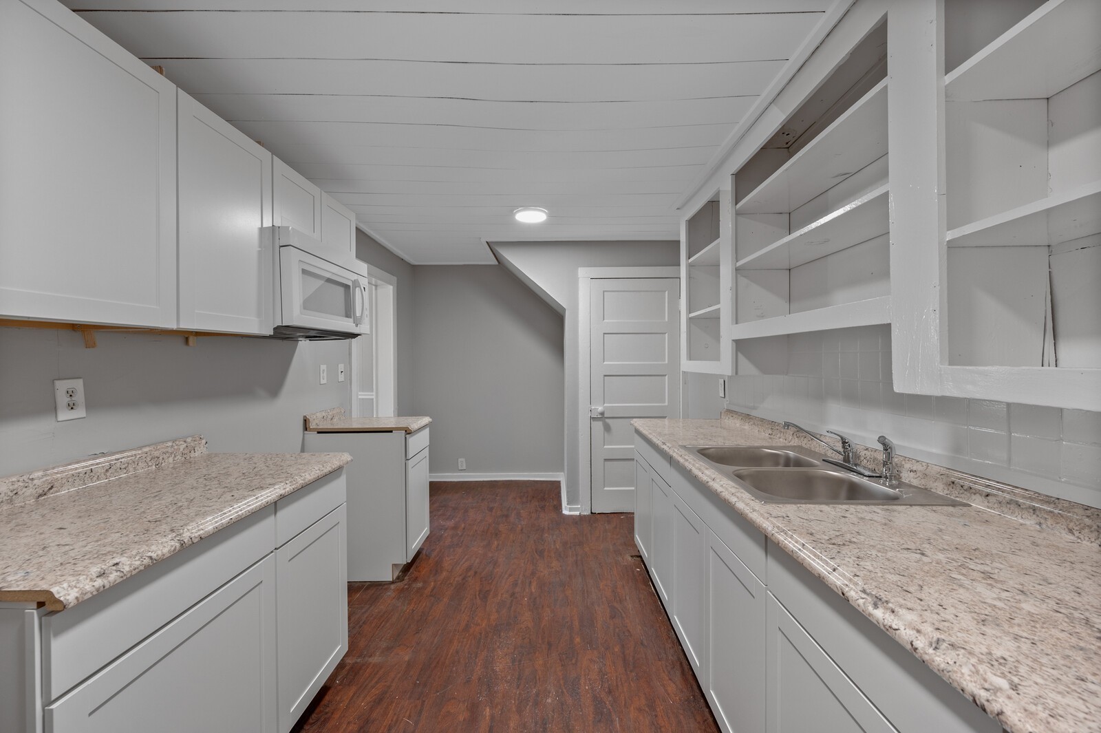 1110 Fowler Street Old Hickory, TN 37138 - Photo 7 of 16 a kitchen with stainless steel appliances granite countertop a sink stove and cabinets