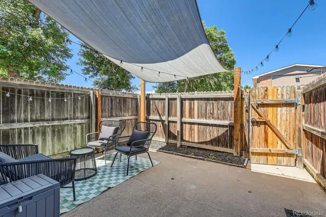 a view of two chairs in the roof deck
