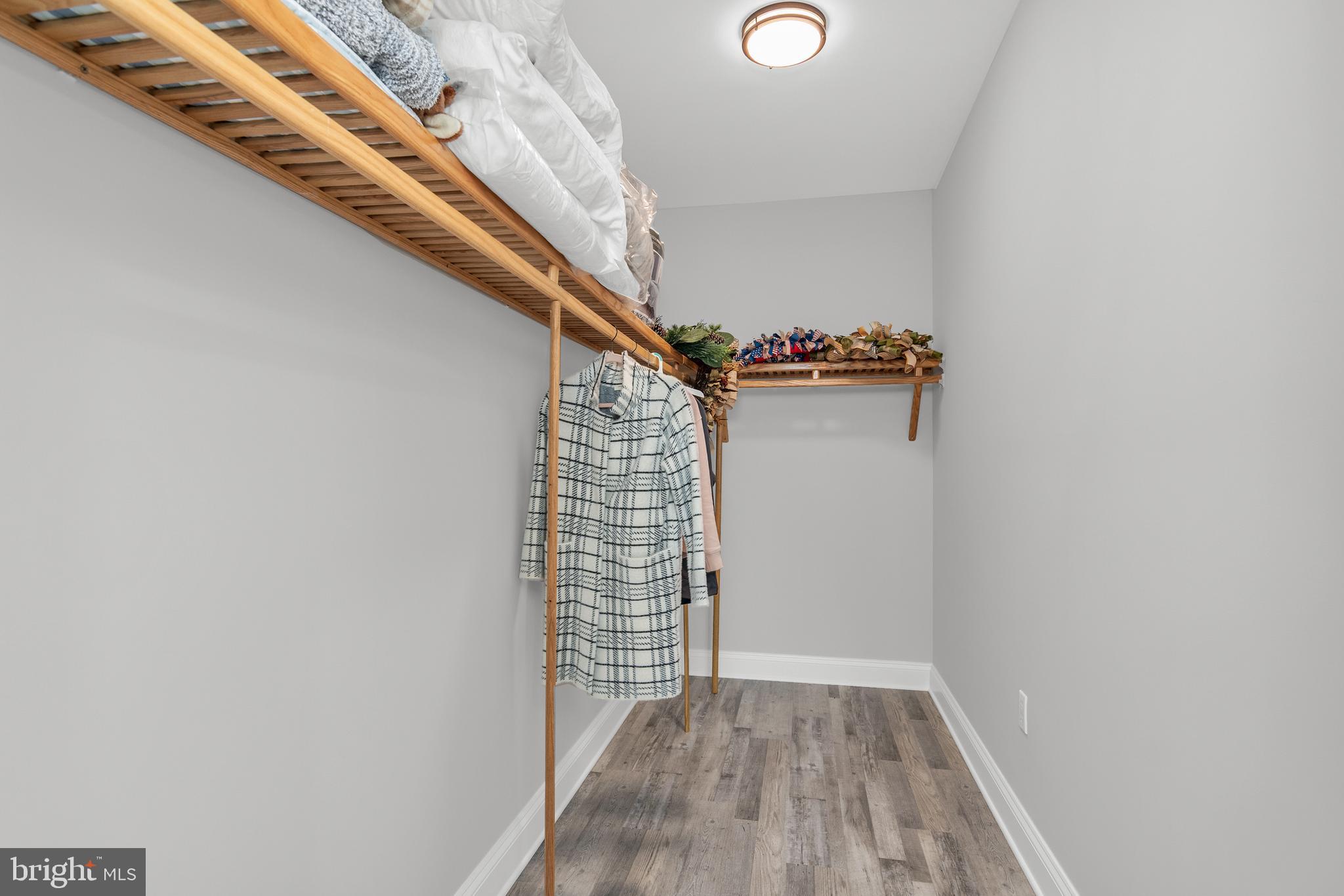 301 Muir Street, Unit 303 Cambridge, MD 21613 - Photo 31 of 36 a view of entryway with wooden floor
