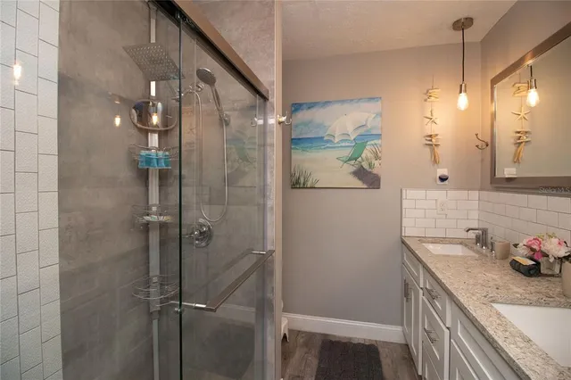 a bathroom with a sink and a mirror