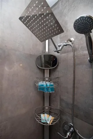 a bedroom with two beds and a window