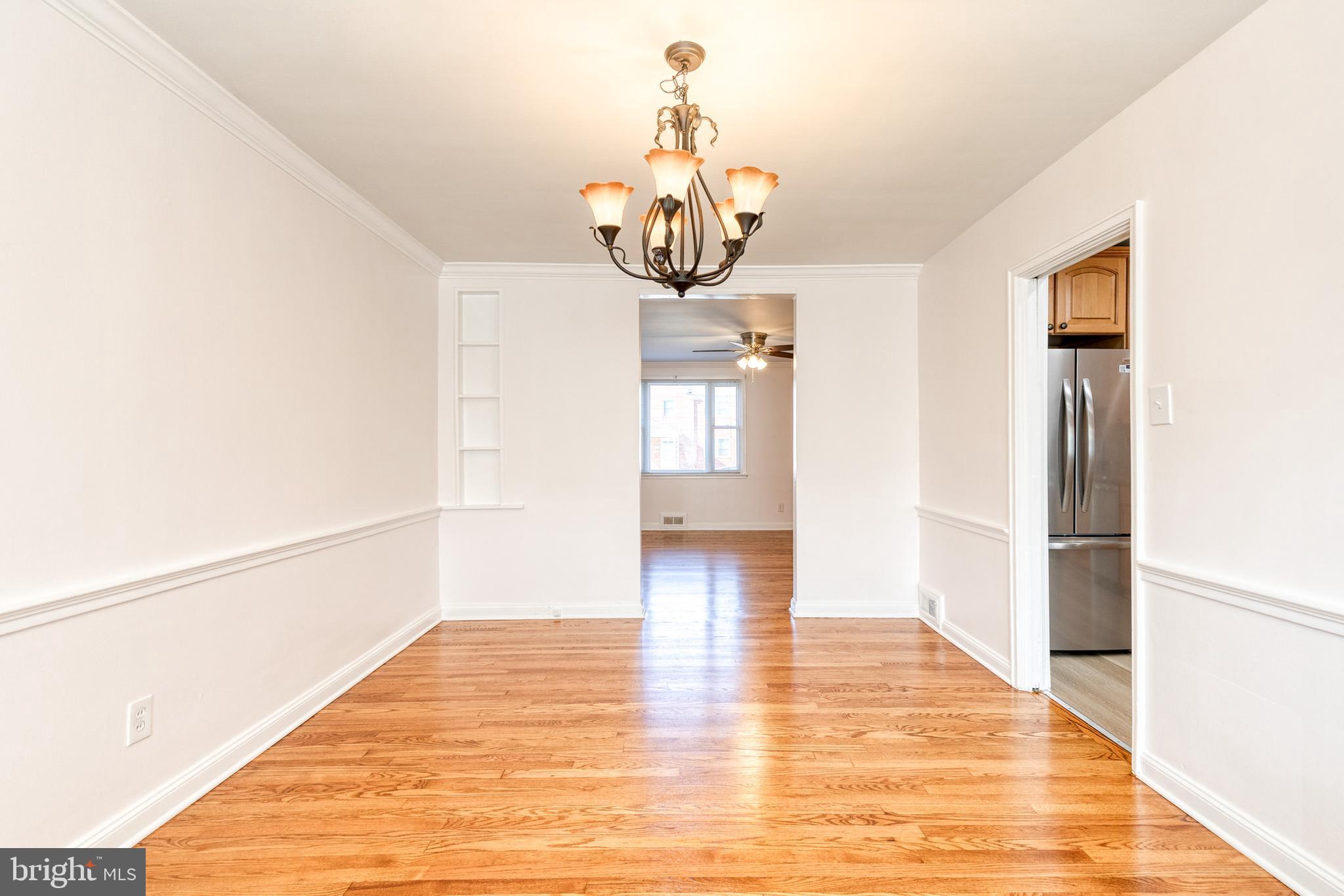 2012 Northbourne Road Baltimore, MD 21239 - Photo 16 of 35 a view of a livingroom with wooden floor