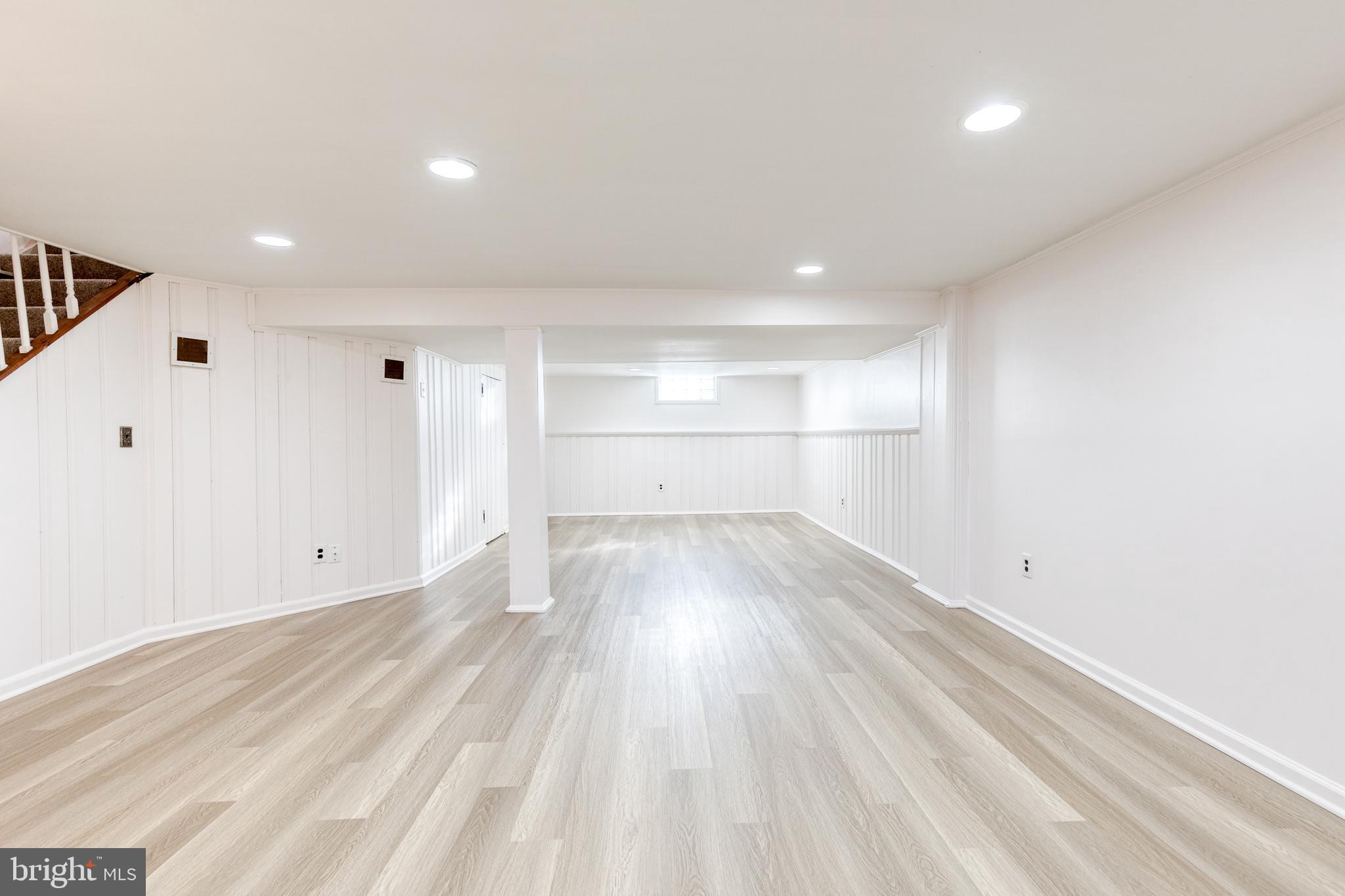 2012 Northbourne Road Baltimore, MD 21239 - Photo 31 of 35 a view of empty room with wooden floor