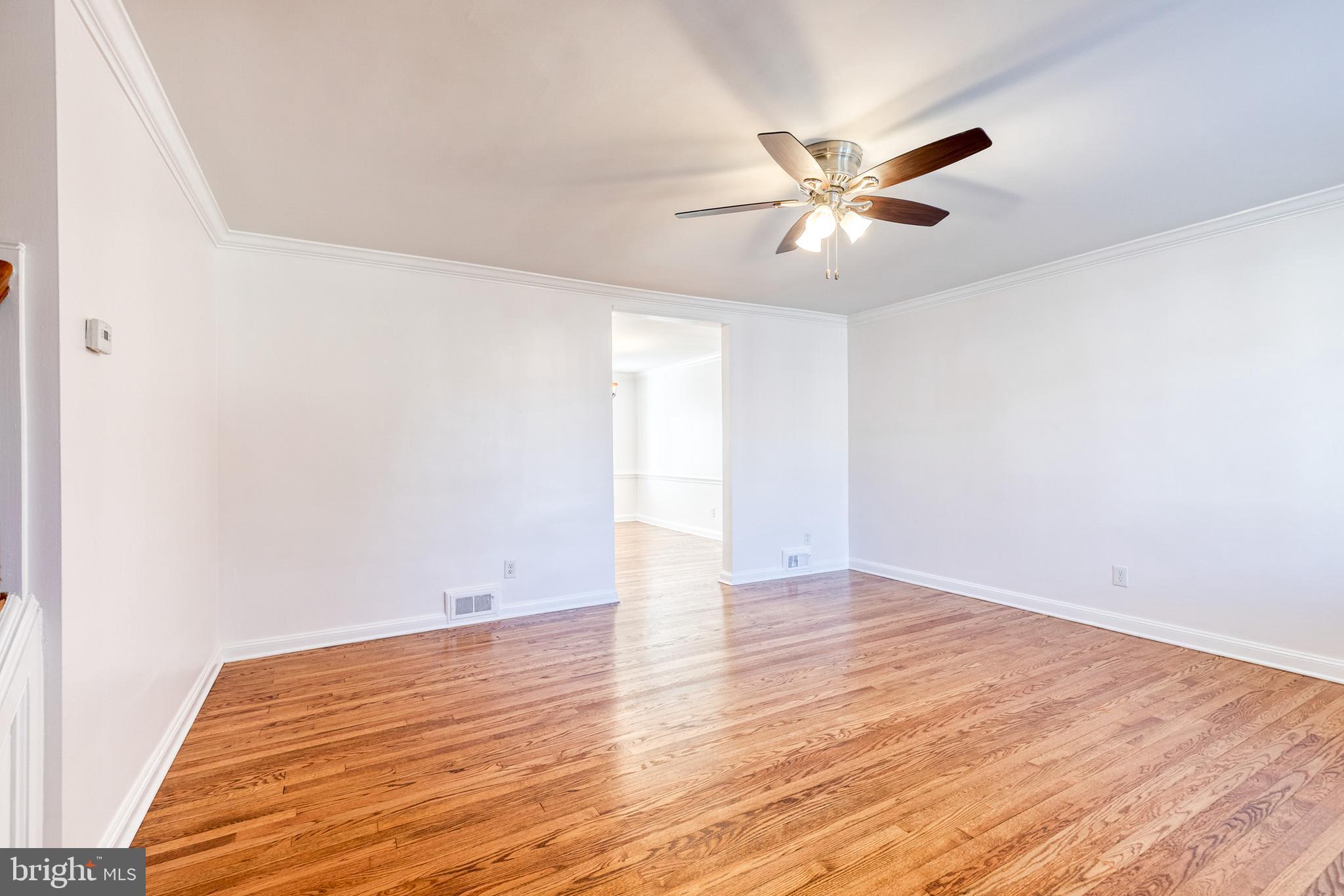 2012 Northbourne Road Baltimore, MD 21239 - Photo 5 of 35 a view of empty room with wooden floor