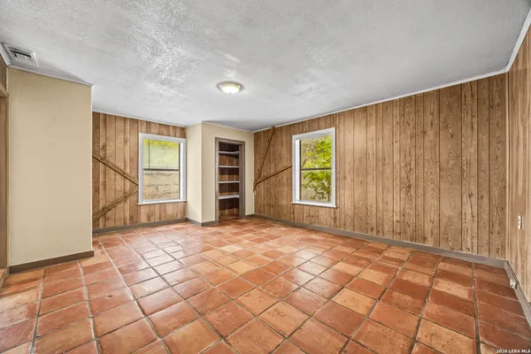 an empty room with windows