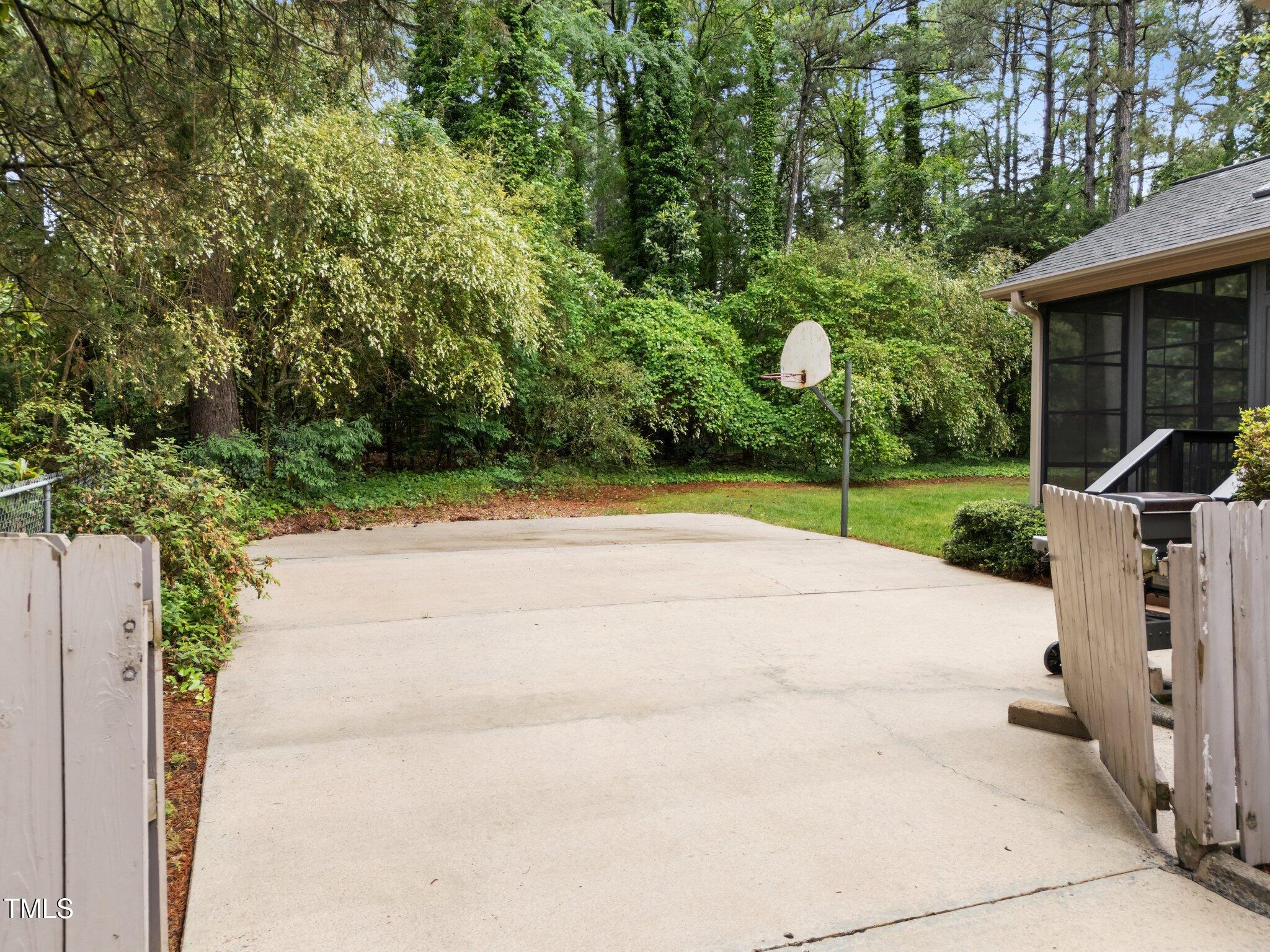 5109 Knaresborough Road Raleigh, NC 27612 - Photo 5 of 35 37-web-or-mls-DJI_20250505160247_0615_D