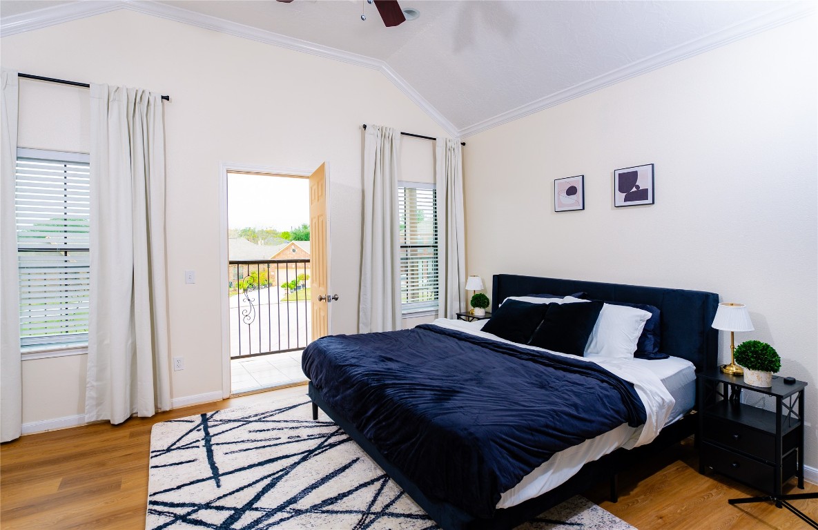 15711 Edo Circle Houston, TX 77083 - Photo 11 of 19 a bedroom with a bed and wooden floor