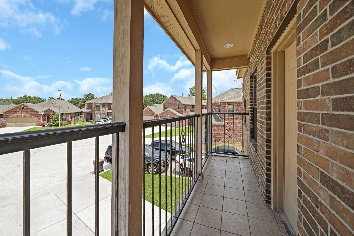 15711 Edo Circle Houston, TX 77083 - Photo 12 of 19 a view of a city from a balcony