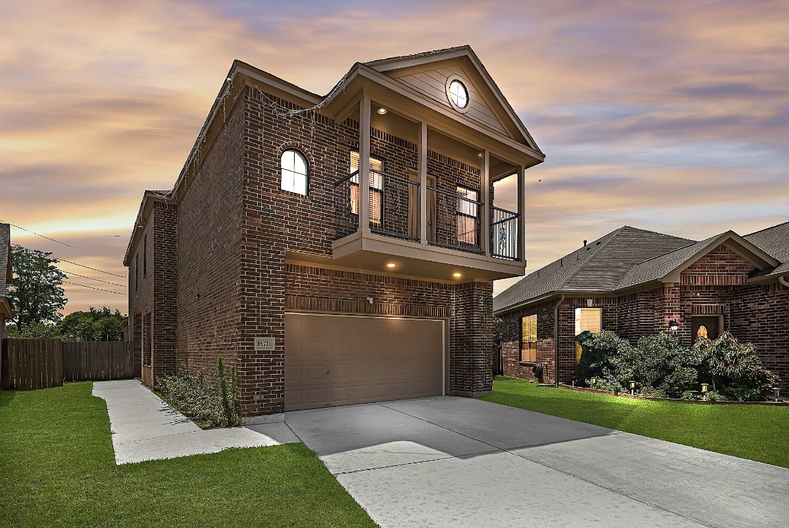 15711 Edo Circle Houston, TX 77083 - Photo 18 of 19 a front view of a house with garden
