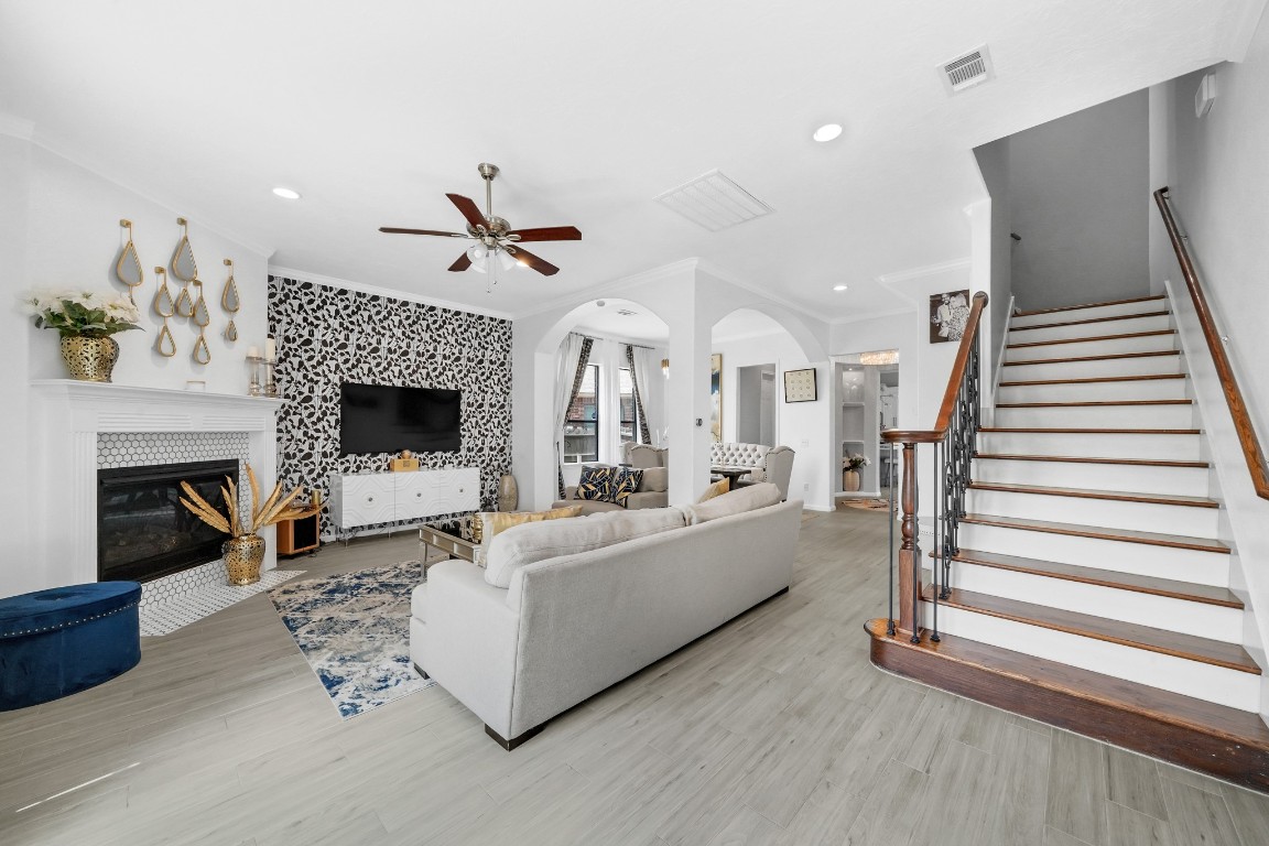 15711 Edo Circle Houston, TX 77083 - Photo 19 of 19 a living room with furniture and a fireplace