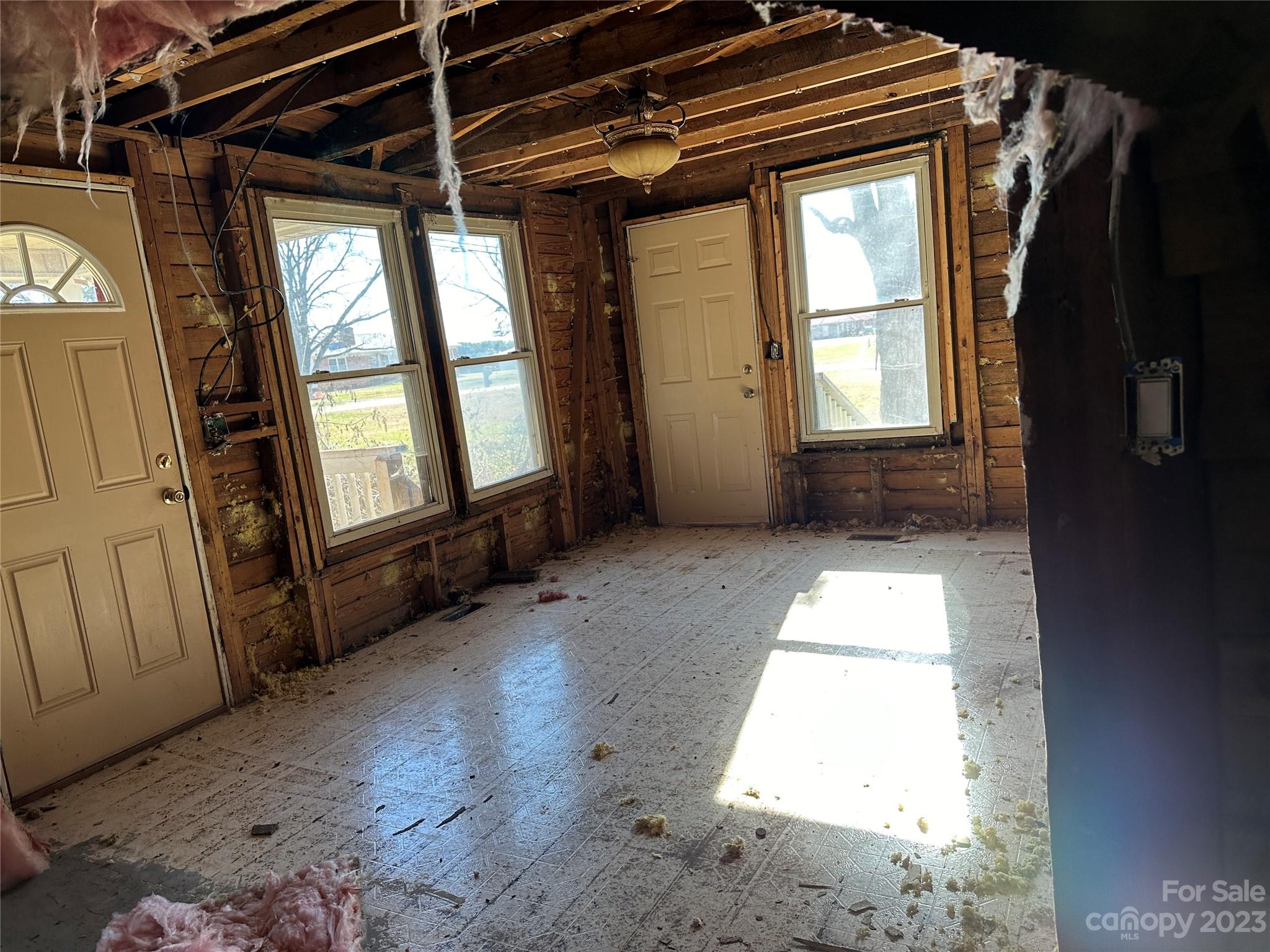 6461 Fallston Road Lawndale, NC 28090 - Photo 13 of 18 a view of empty room with wooden floor and fan