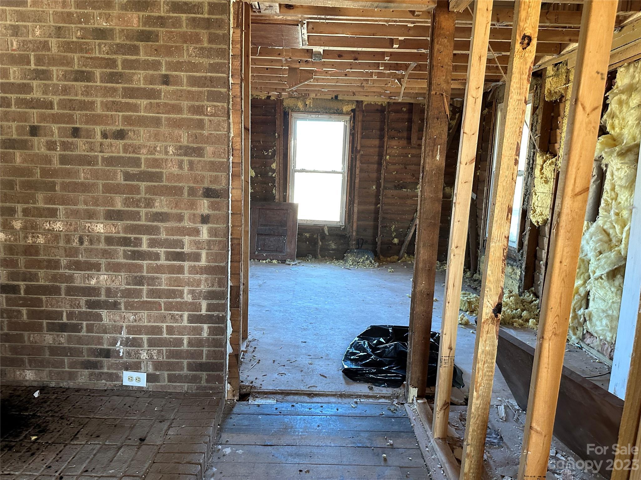 6461 Fallston Road Lawndale, NC 28090 - Photo 14 of 18 a view of a door and chair in wooden floor