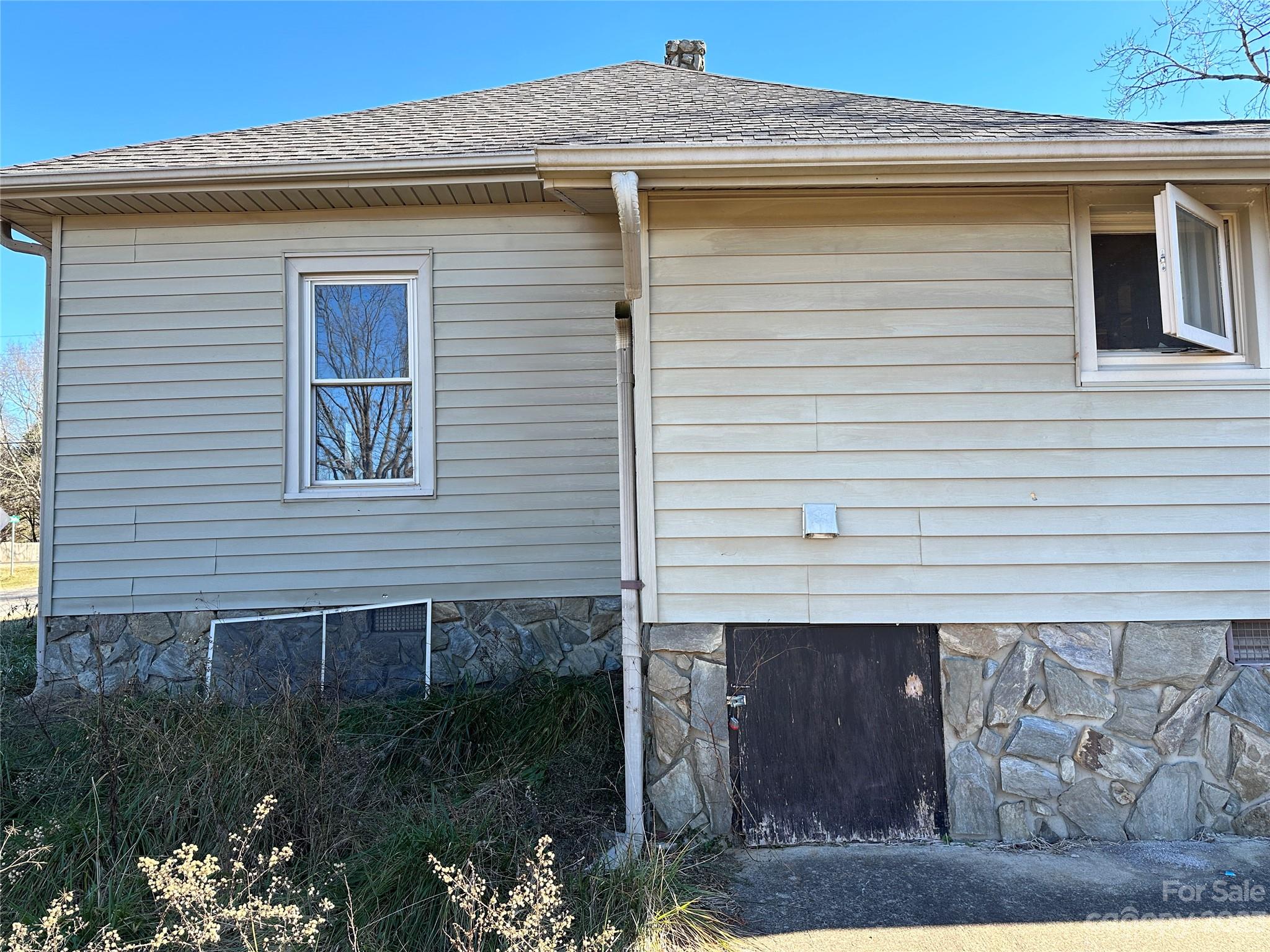6461 Fallston Road Lawndale, NC 28090 - Photo 5 of 18 a front view of a house with garden