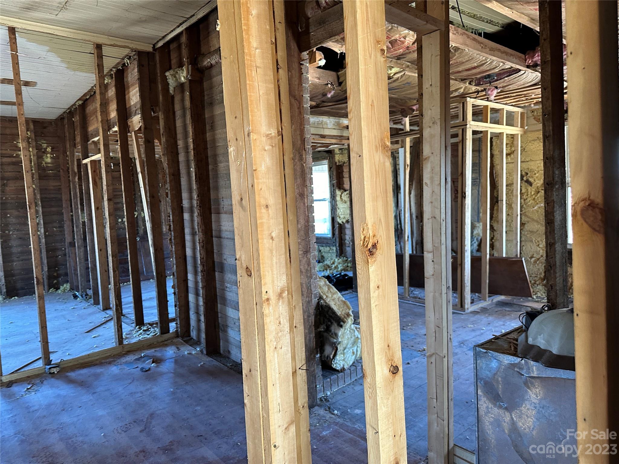 6461 Fallston Road Lawndale, NC 28090 - Photo 10 of 18 a view of a hallway with wooden floor and staircase