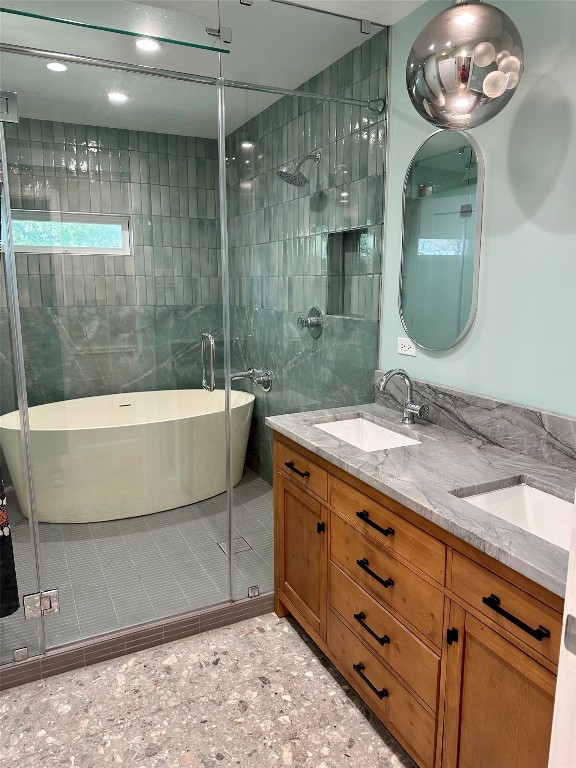 2507 East Side Drive Austin, TX 78704 - Photo 11 of 26 a bathroom with a sink a bathtub a mirror and a shower