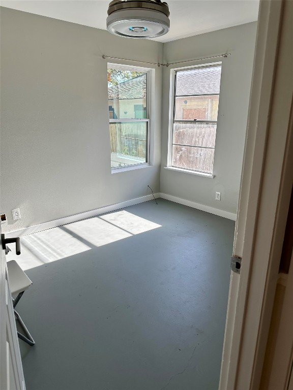 2507 East Side Drive Austin, TX 78704 - Photo 13 of 26 an empty room with windows