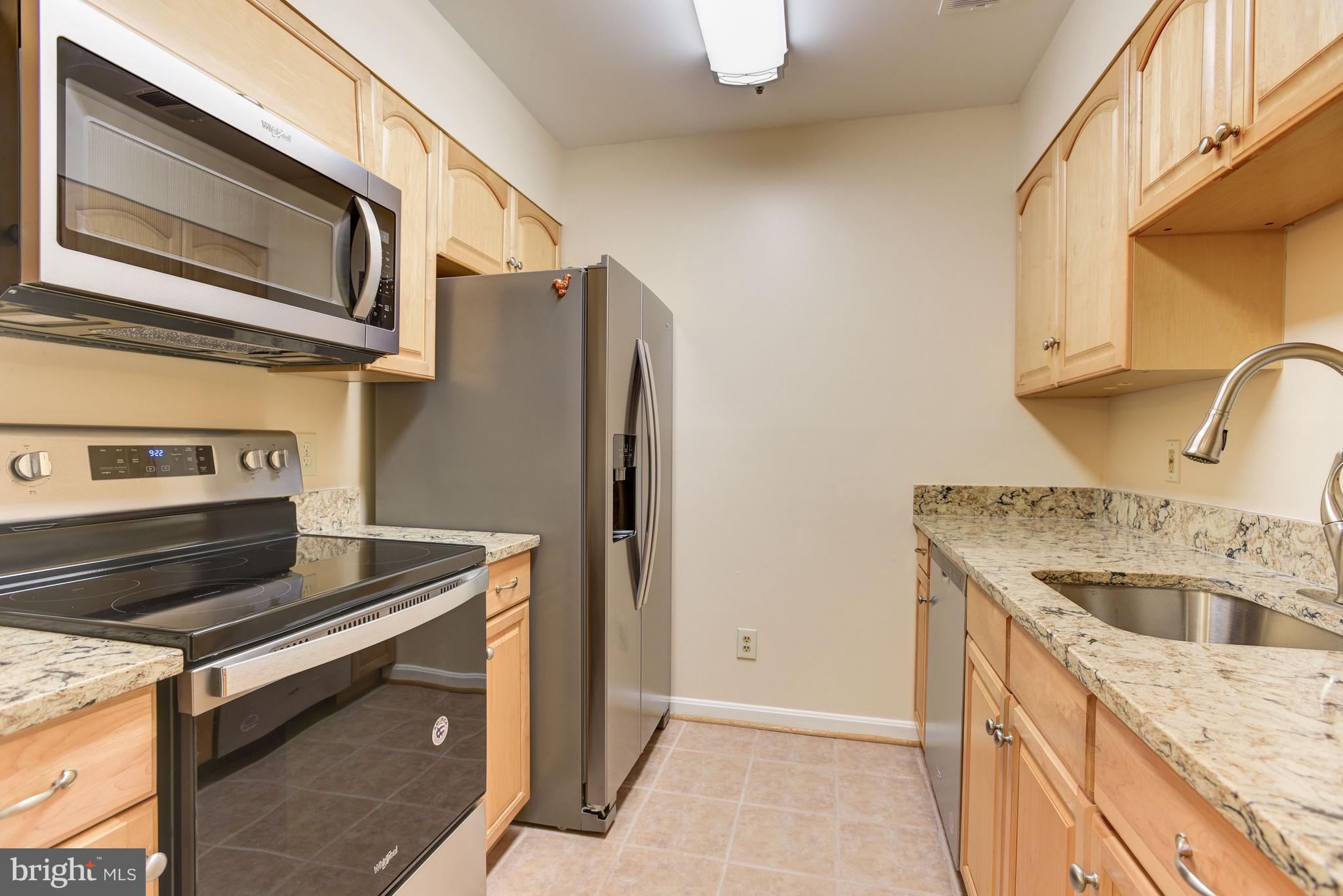 4912 Columbia Road, Unit 2 112 Columbia, MD 21044 - Photo 11 of 24 Kitchen | Granite Countertops