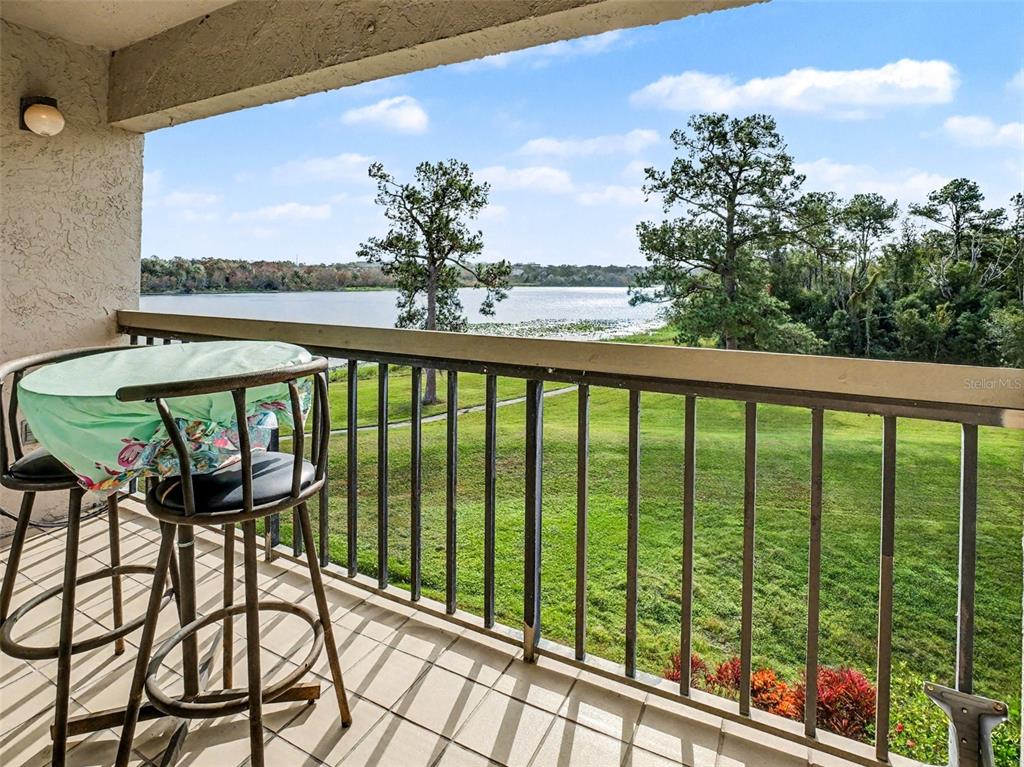 1052 Lotus Cove Court, Unit 733 Altamonte Springs, FL 32714 - Photo 3 of 28 a view of a outdoor seating area