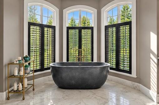 435 Myoma Road Mars, PA 16046 - Photo 19 of 50 Spa-inspired primary bath featuring a sculptural freestanding soaking tub and a wall of arched windows.
