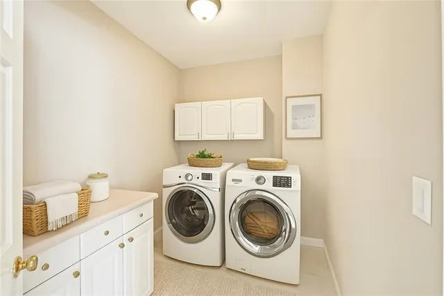 a view of an empty room with a cabinet