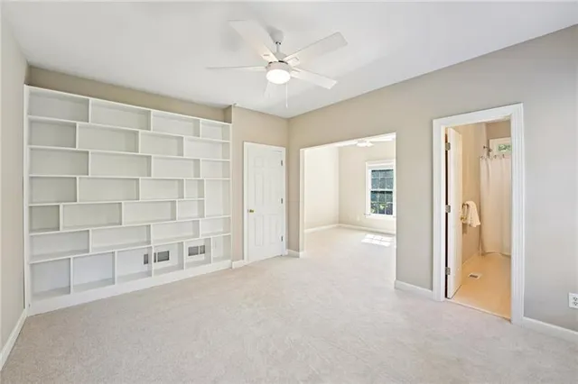 a view of staircase with rug floor