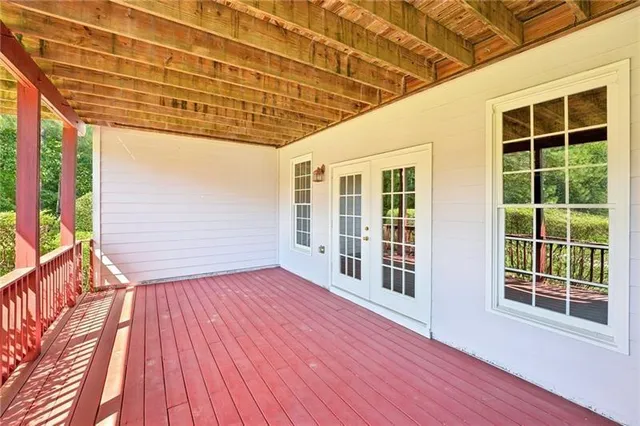 an aerial view of residential house with outdoor space and swimming pool