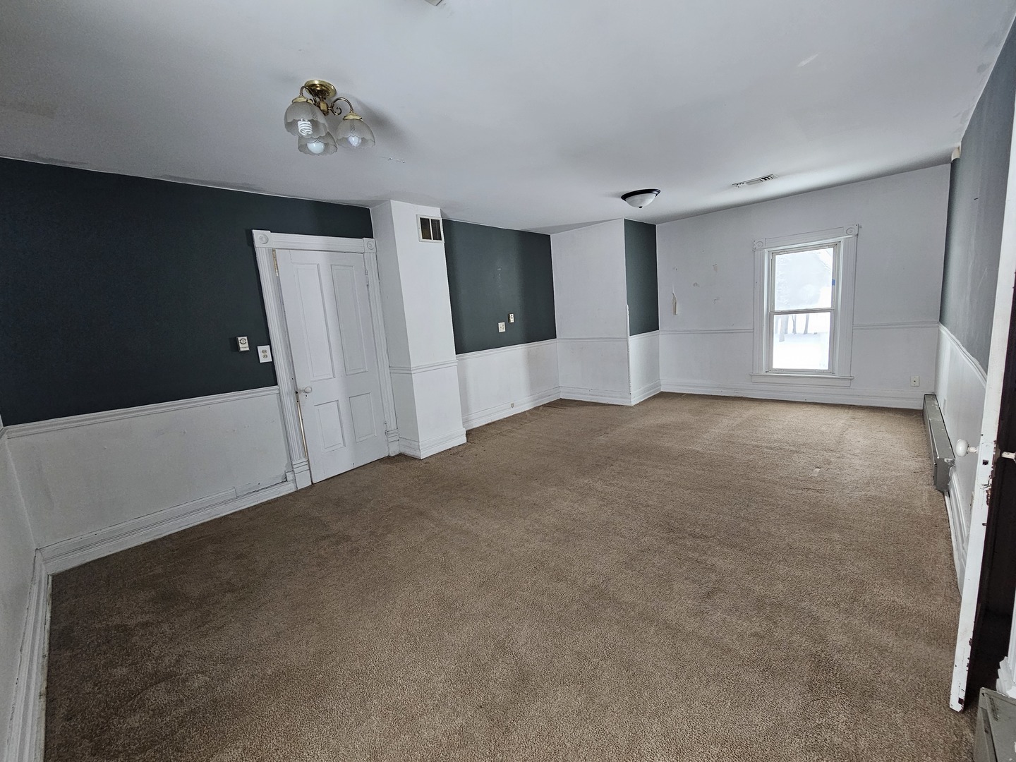 3926 East 1750th Road Sheridan, IL 60551 - Photo 8 of 23 a view of a livingroom with a dishwasher and a refrigerator