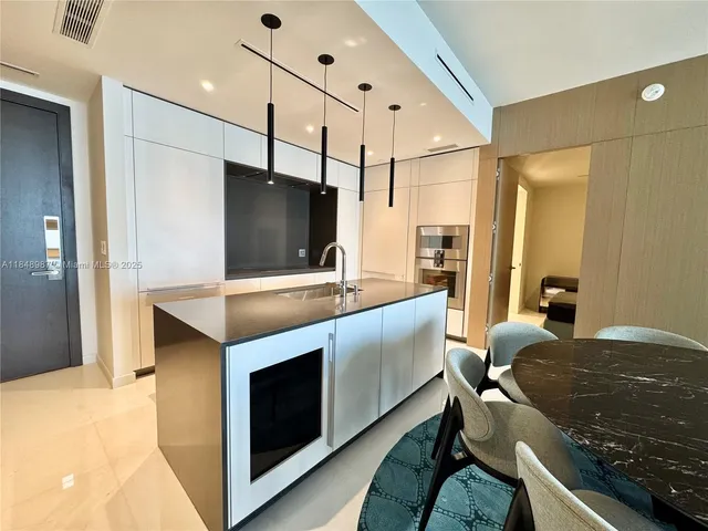 a view of a livingroom with furniture and a table