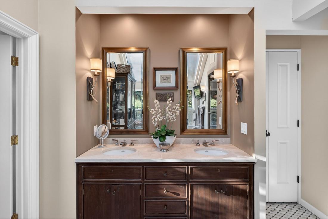 3970 Leavesley Road Gilroy, CA 95020 - Photo 29 of 52 a bathroom with a sink and a mirror