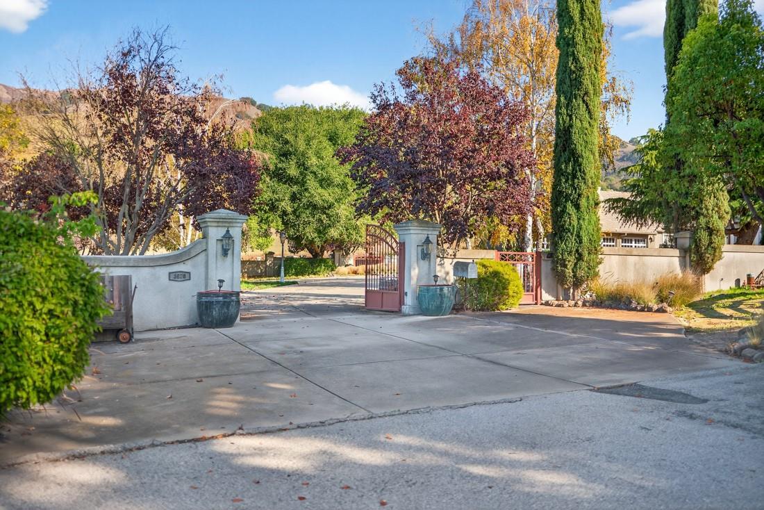 3970 Leavesley Road Gilroy, CA 95020 - Photo 52 of 52 a view of a house with a yard and large tree