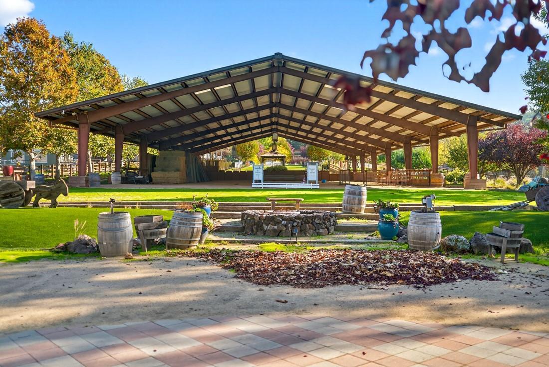 3970 Leavesley Road Gilroy, CA 95020 - Photo 10 of 52 a view of a big building with a big yard and large trees