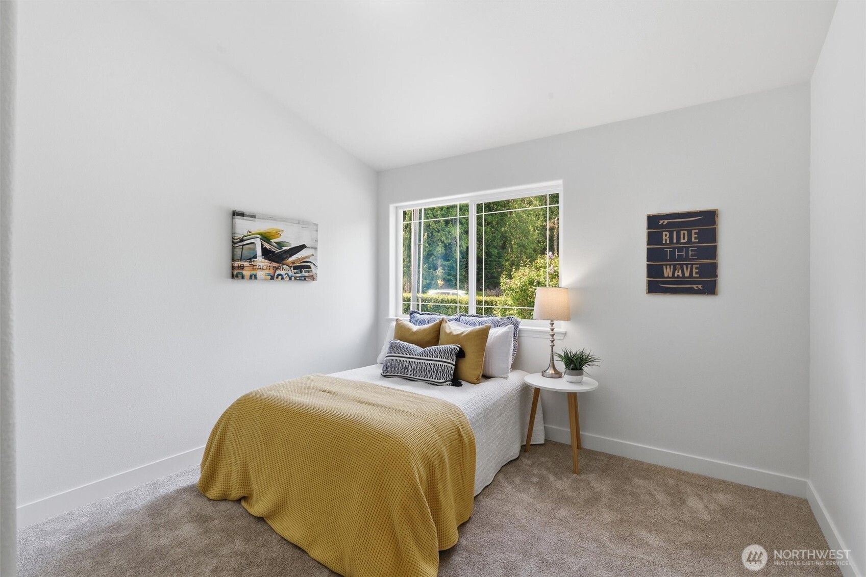 5523 East Wishon Road Snohomish, WA 98290 - Photo 26 of 39 a bed room with a bed and a painting on the wall