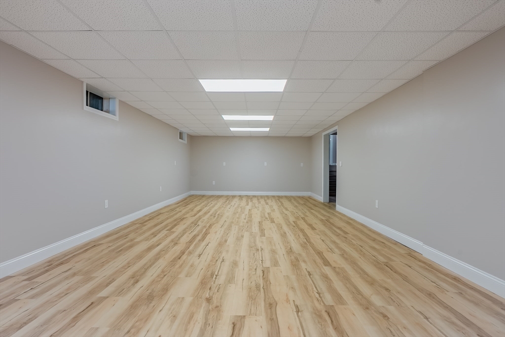 41 Watuppa Road Westport, MA 02790 - Photo 35 of 42 a view of empty room with wooden floor