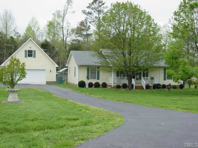 7005 Kiger Road Rougemont, NC 27572 - Photo 1 of 1 a front view of a house with a yard