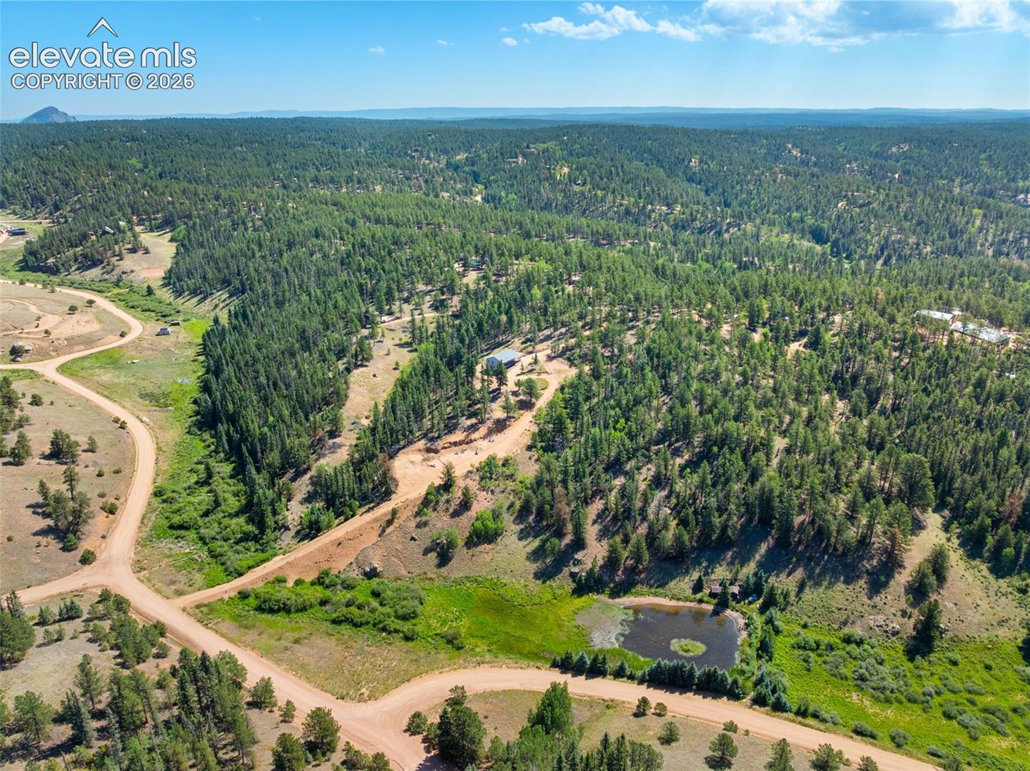 2775 Pathfinder Road Florissant, CO 80816 - Photo 49 of 49 Showing Secondary Driveway.
