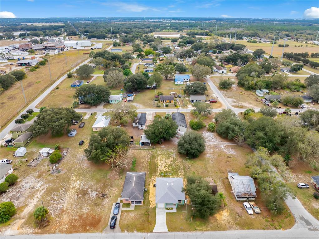 833 3rd Avenue Dundee, FL 33838 - Photo 33 of 37 an aerial view of residential houses with outdoor space