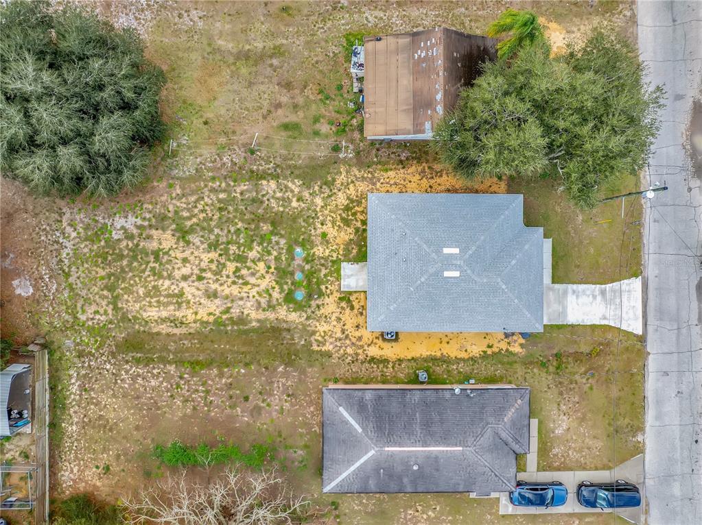 833 3rd Avenue Dundee, FL 33838 - Photo 35 of 37 aerial view of a house with a yard