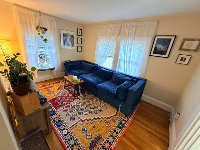 a living room with furniture and a couch