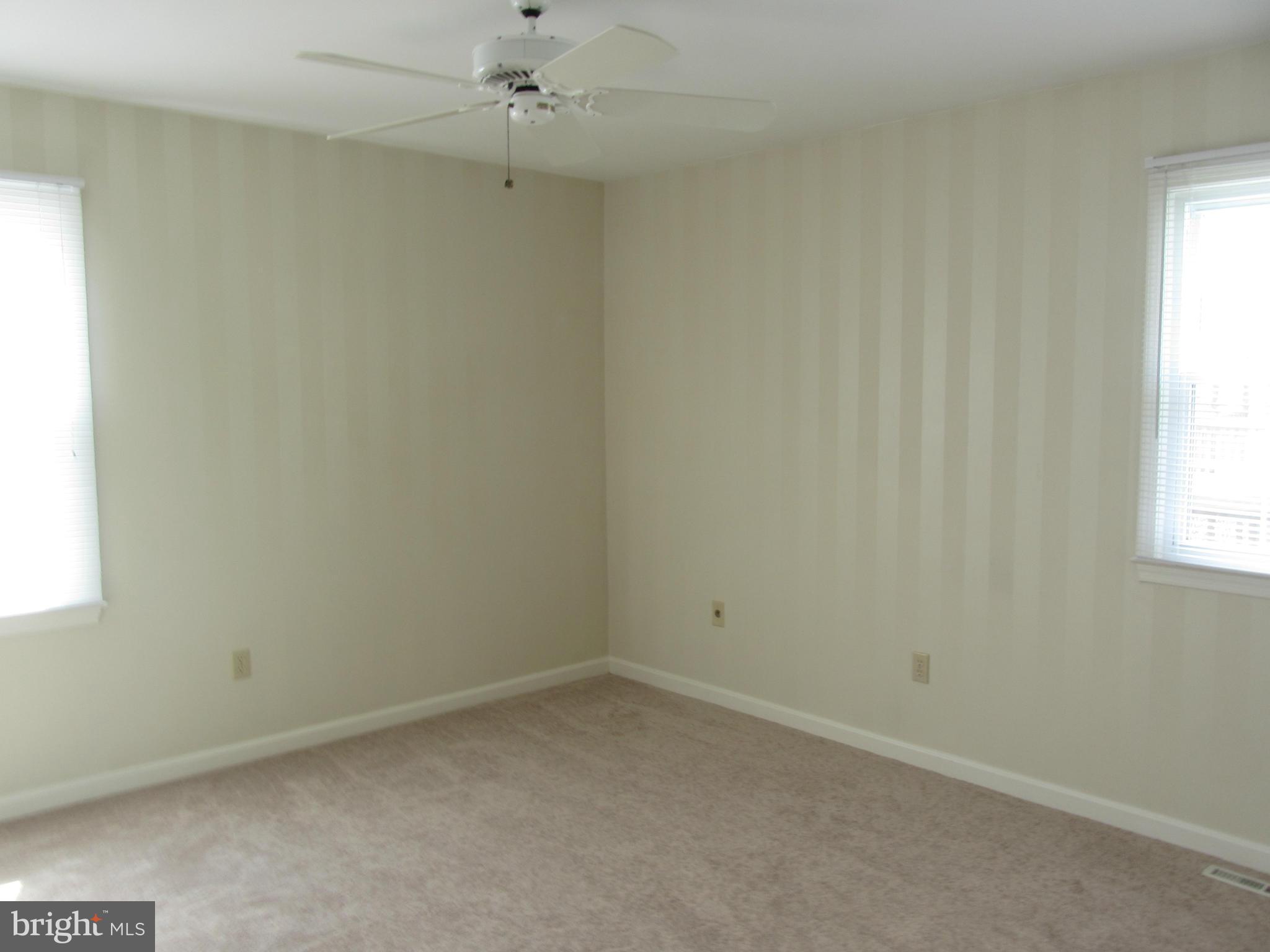 9003 Transoms Road Baltimore, MD 21236 - Photo 12 of 29 an empty room with a window