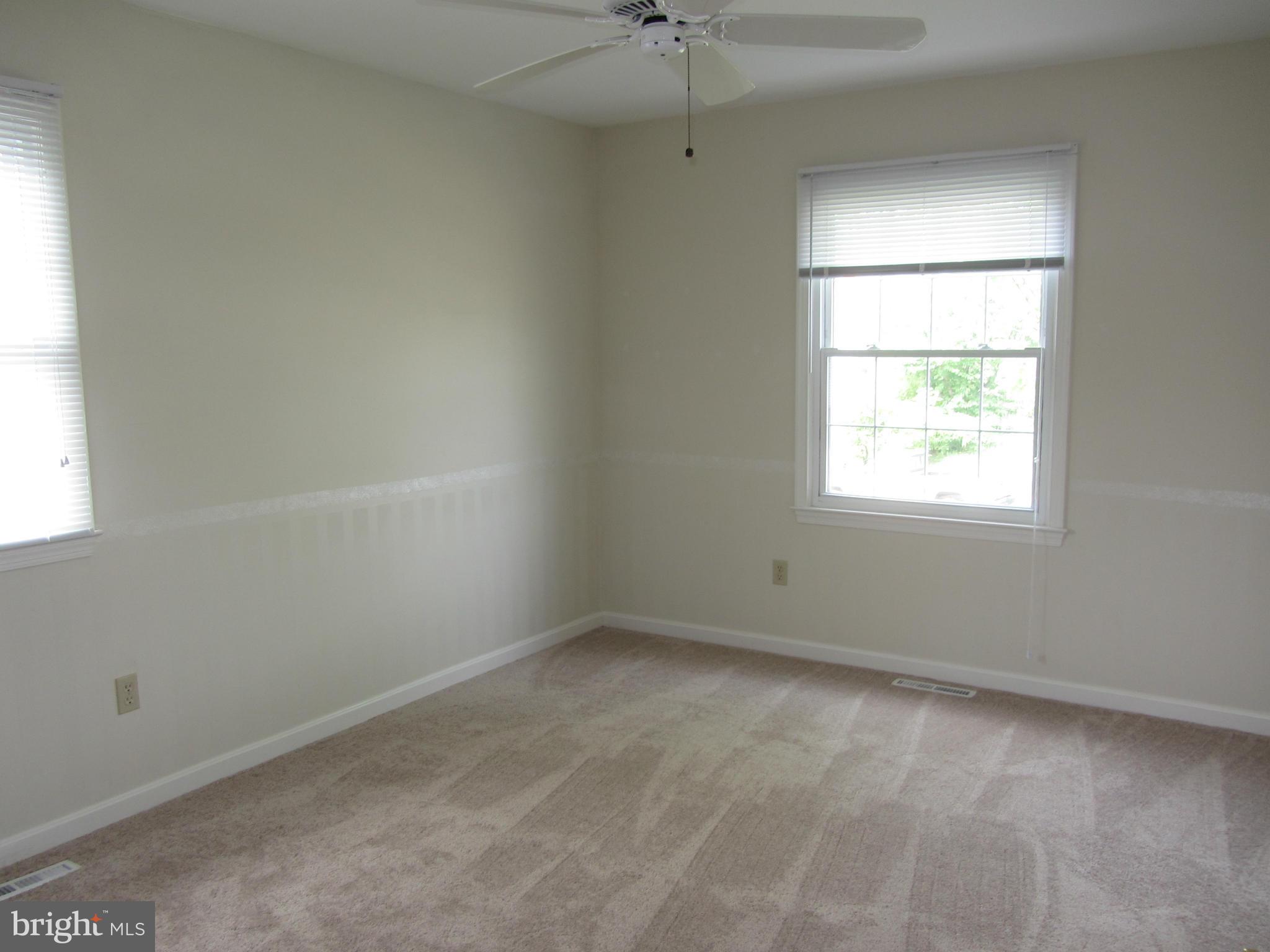9003 Transoms Road Baltimore, MD 21236 - Photo 15 of 29 an empty room with a window