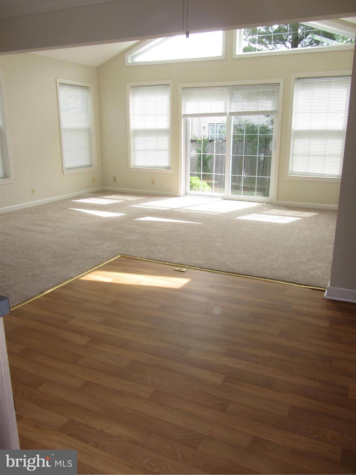 9003 Transoms Road Baltimore, MD 21236 - Photo 5 of 29 a view of empty room with window and fireplace